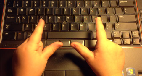 photo of hands on a keyboard