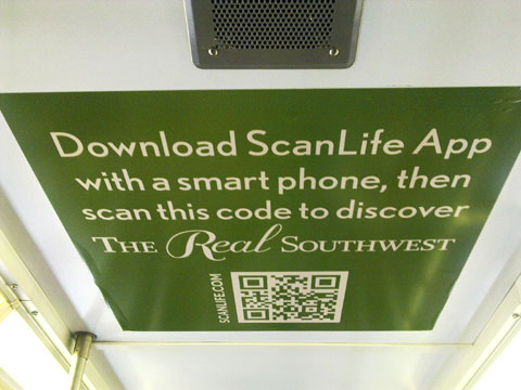 photo of QR codes for Real Southwest campaign on train ceiling