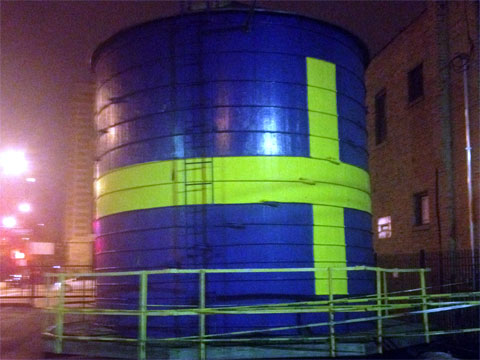 photo of gravity tank with Swedish flag painted on it in Andersonville, Chicago