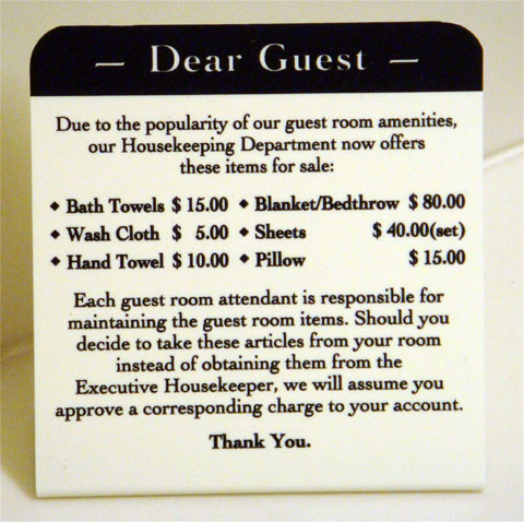 photo of hotel towel pricing sign