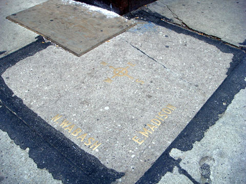 photo of sidewalk at corner of Wabash and Madison, Chicago before construction