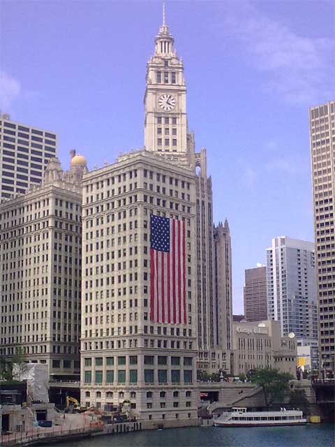 photo of US flag on the Wrigley Building, Chicago