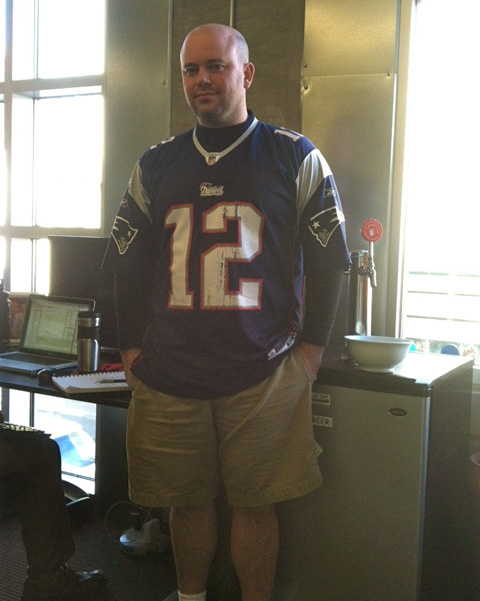 photo of Jared of Name.com wearing a Patriots Tom Brady jersey