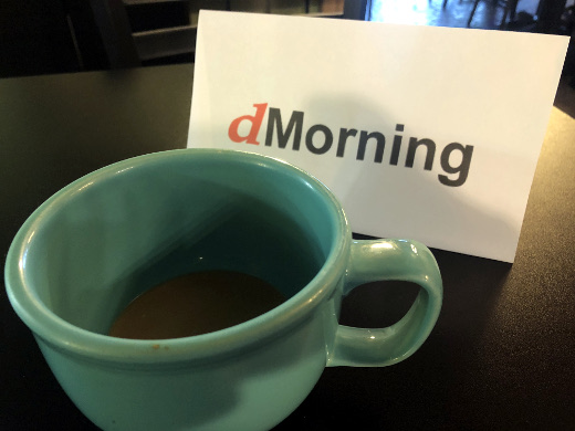 photo of dMorning sign and mug