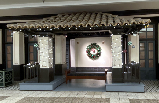 photo of an empty mall store decorated for Christmas