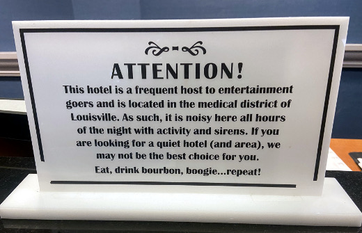 photo of honest hotel sign at Hampton Inn Louisville Kentucky