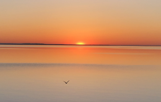 photo of sunrise over Lake Huron from St. Ignace Michigan