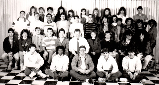 photo of WNEK-FM station members in 1988 – Mike is in the middle of the second row in the tie